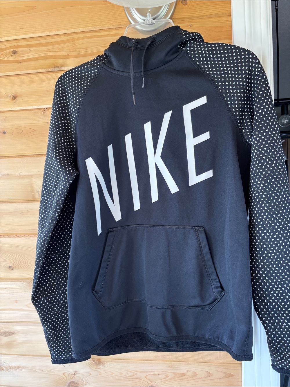 Nike Black Hoodie with White NIKE Script and Dotted Sleeve Accents